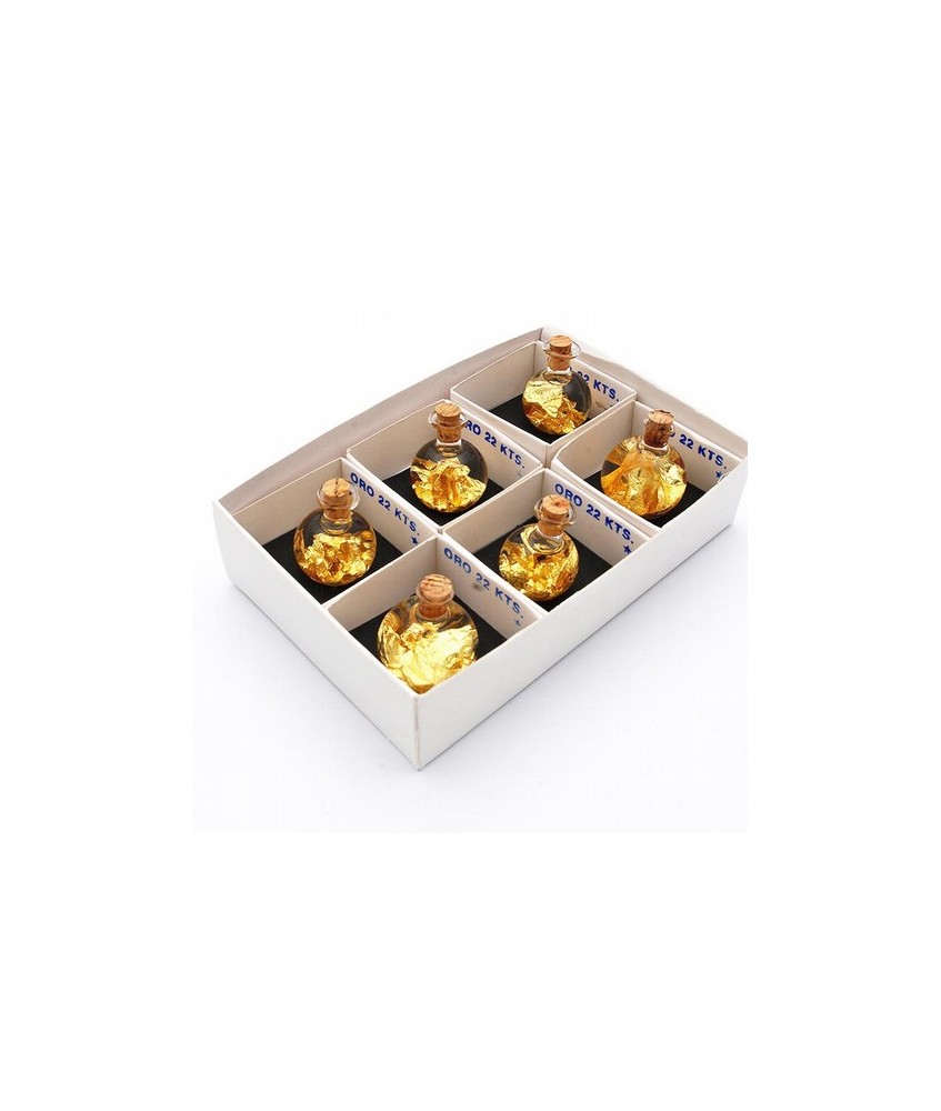 Matraz en vidrio soplado con oro 22k.
Medida 3cm alto