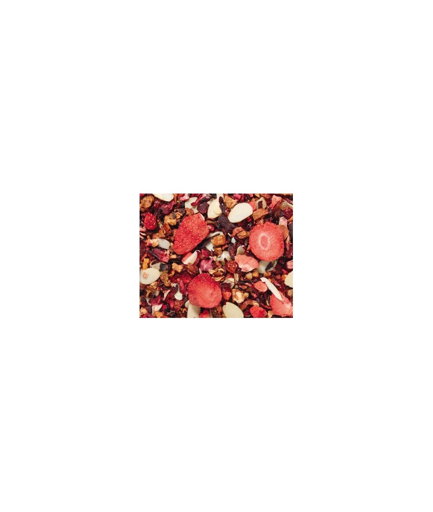 trozos de manzana, flor de hibisco, cáscara de escaramujo, cubitos de piña (piña, azúcar), trocitos de almendras, pedacitos cro