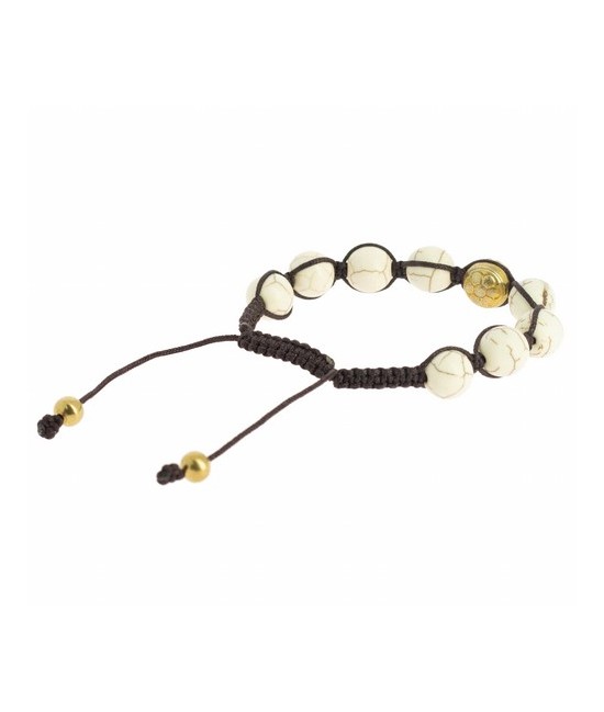 Pulsera Shambala Om Magnesita
Code: BI256
Características técnicas: 
Ø ±10 mm, magnesita y metal dorado (aleación de cobre y