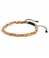 Las cuentas de esta pulsera están hechas a mano. Para los tibetanos las pulseras metálicas son joyas medicinales. Se les otorga