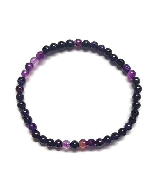 Pulsera elástica muy fina compuesta de cuentas de ágata de 4 mm de diámetro.

Presentado en una lámina de cartón que muestra 