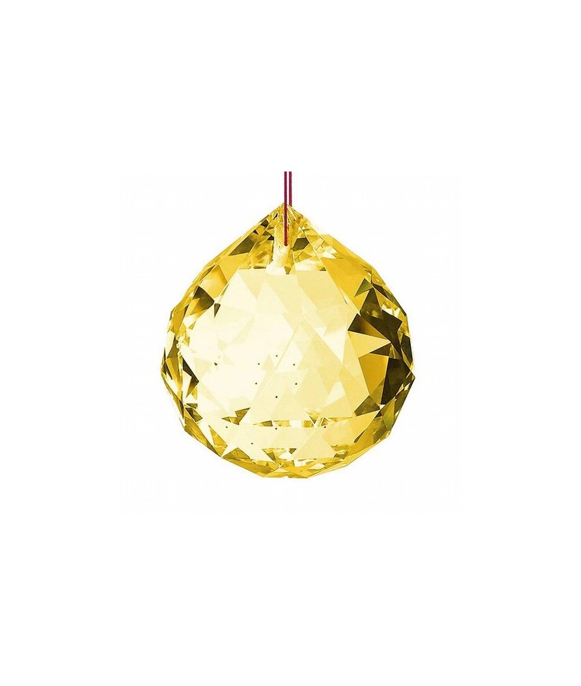 Bola facetada de cristal AMBAR de 50 mm. de diametro.
Engarzada en hilo rojo.

En el feng Shui, las bolas de cristal se util