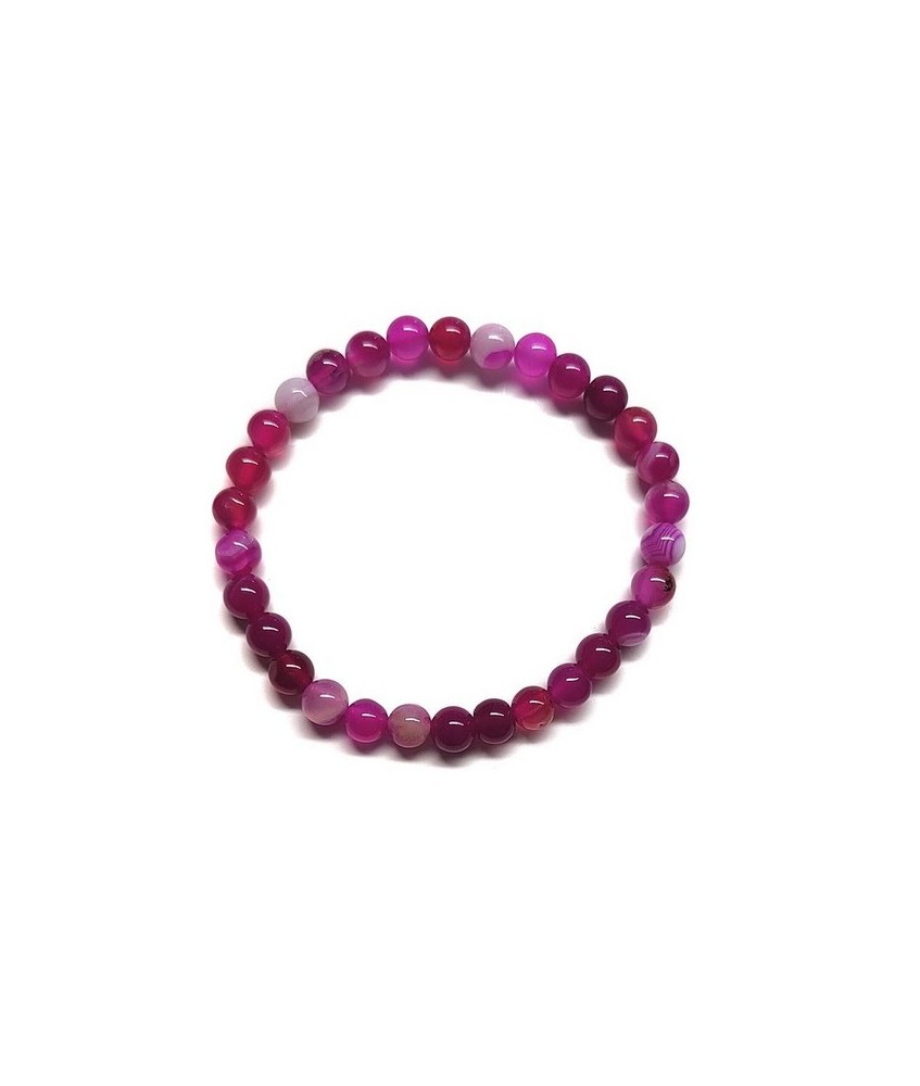 Pulsera elástica muy fina compuesta de cuentas de ágata de 6 mm de diámetro.

Presentado en una lámina de cartón que muestra 