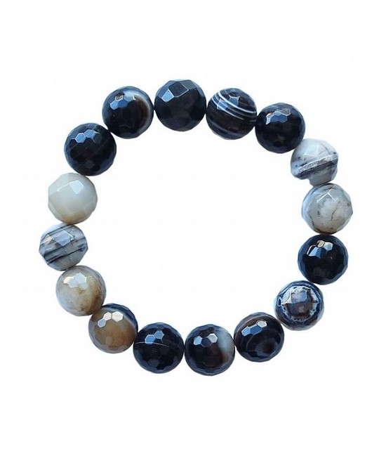 Pulsera de Ágata bandeada. Pulsera facetada en bolas de 12mm.

En goma elástica.