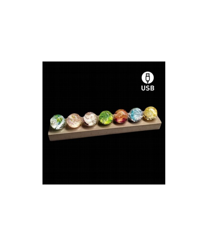 Lámpara 7 Bolas de colores y base de madera.

Las 7 esferas representan los 7 chakras del cuerpo.

Medidas: la base mide 30