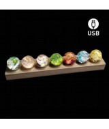 Lámpara 7 Bolas de colores y base de madera.

Las 7 esferas representan los 7 chakras del cuerpo.

Medidas: la base mide 30
