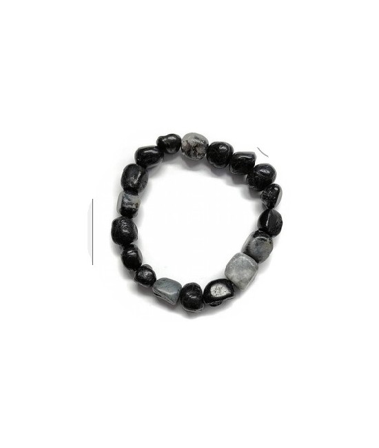 Pulsera de Turmalina en forma de rodado engarzado con silicona elástica.

Medida mineral: 1 x 0.5 cm