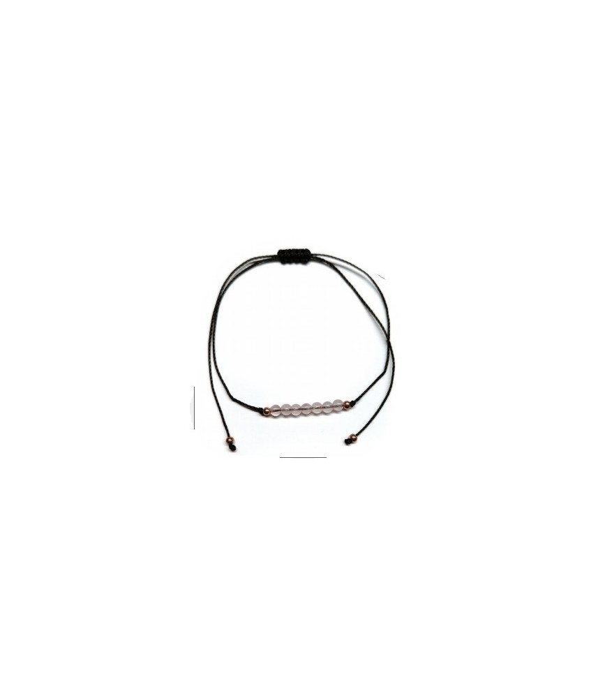 Pulsera de bolas de Cuarzo Rosa de 4mm en hilo negro ajustable.

Tarjeta exclusiva en 3 idiomas.