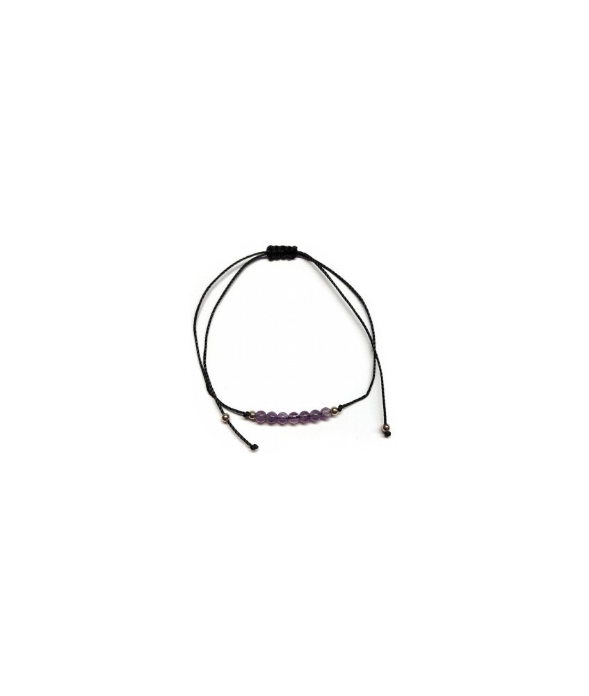 Pulsera de bolas de Amatista de 4mm en hilo negro ajustable.

Tarjeta exclusiva en 3 idiomas.