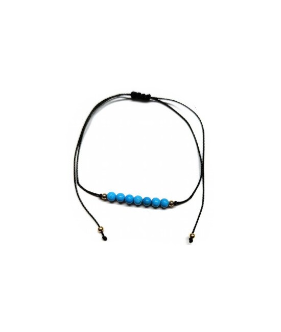Pulsera de bolas de Turquenita de 4mm en hilo negro ajustable.

Tarjeta exclusiva en 3 idiomas.
