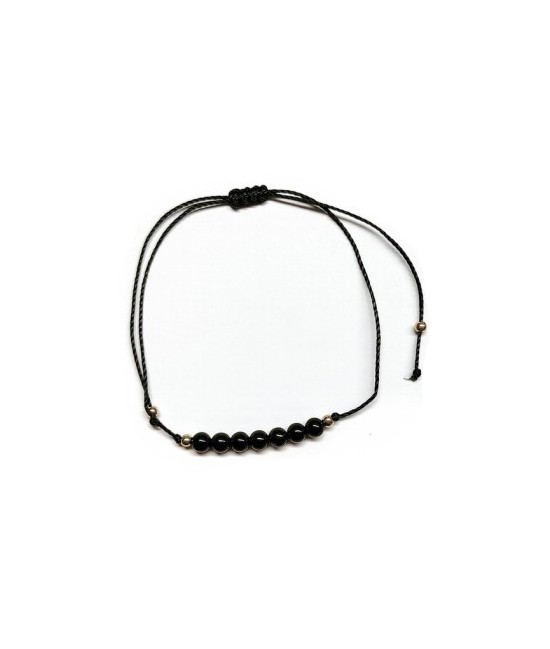 Pulsera de bolas de Onix de 4mm en hilo negro ajustable.

Tarjeta exclusiva en 3 idiomas.