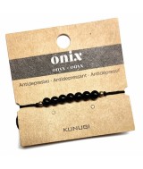 Pulsera de bolas de Onix de 4mm en hilo negro ajustable.

Tarjeta exclusiva en 3 idiomas.