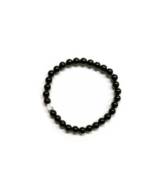 Pulsera de Ónix( bolas de 6mm) con símbolo de corazón plateado.

En goma elástica.

Tarjeta exclusiva en 3 idiomas.