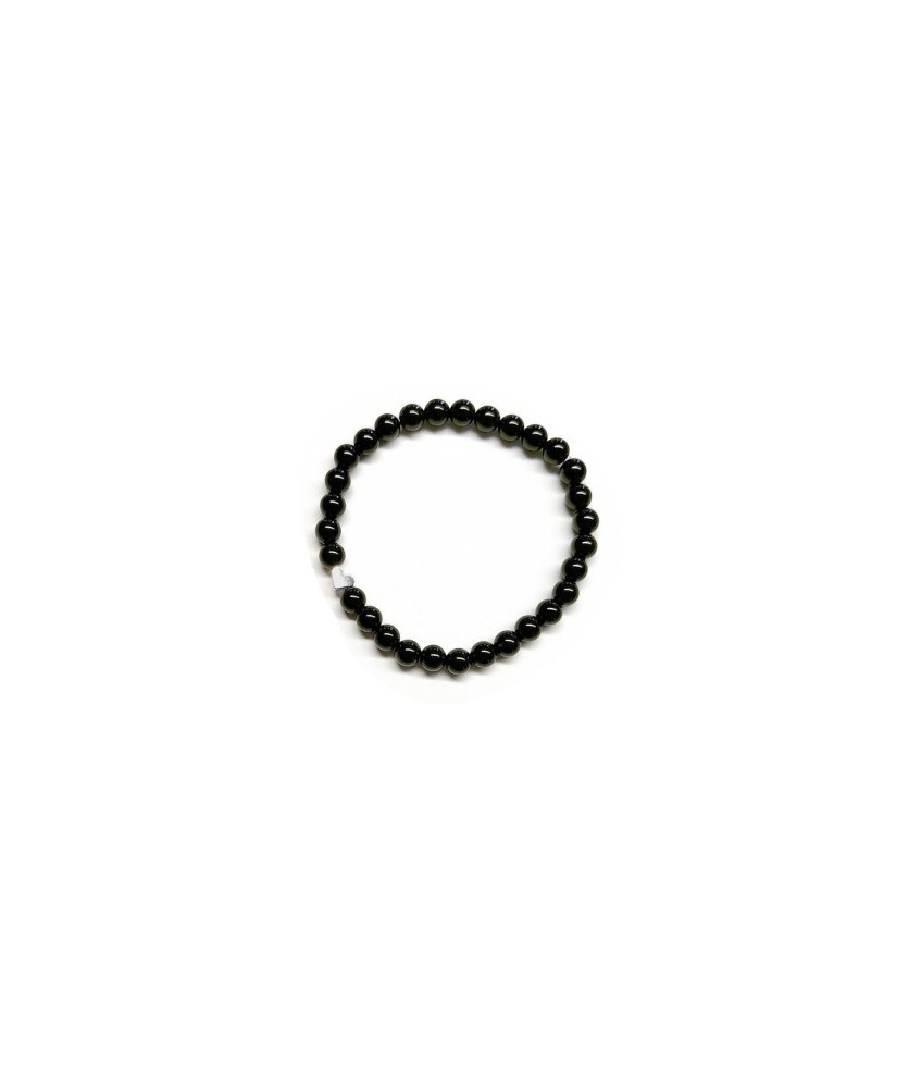 Pulsera de Ónix( bolas de 6mm) con símbolo de corazón plateado.

En goma elástica.

Tarjeta exclusiva en 3 idiomas.