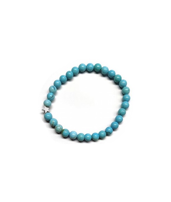 Pulsera de Turquenita (bolas de 6mm) con símbolo de estrella plateada.

En goma elástica.