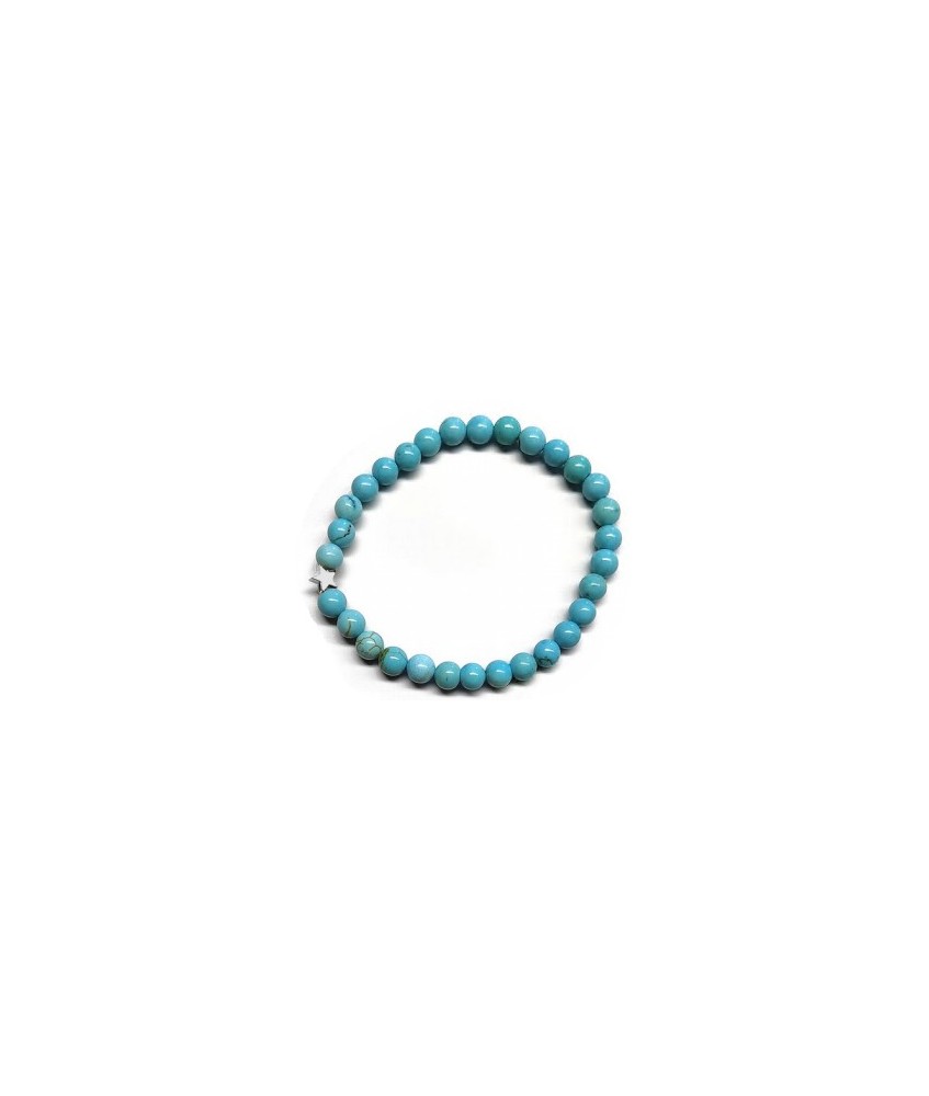 Pulsera de Turquenita (bolas de 6mm) con símbolo de estrella plateada.

En goma elástica.