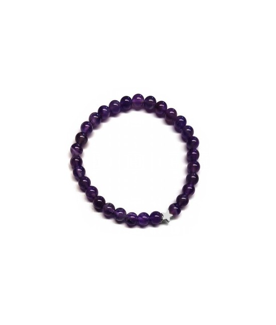 Pulsera de Amatista (bolas de 6mm) con símbolo de estrella plateada.

En goma elástica.

Tarjeta exclusiva en 3 idiomas.
