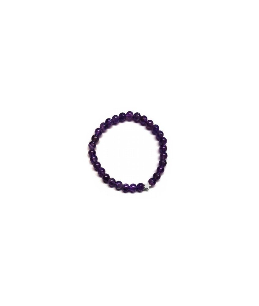 Pulsera de Amatista (bolas de 6mm) con símbolo de estrella plateada.

En goma elástica.

Tarjeta exclusiva en 3 idiomas.