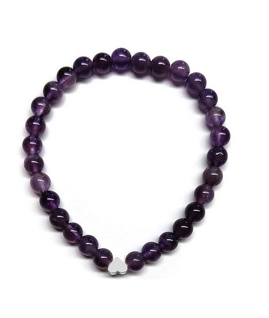 Pulsera de Amatista (bolas de 6mm) con símbolo de corazón plateado.

En goma elástica.

Tarjeta exclusiva en 3 idiomas.