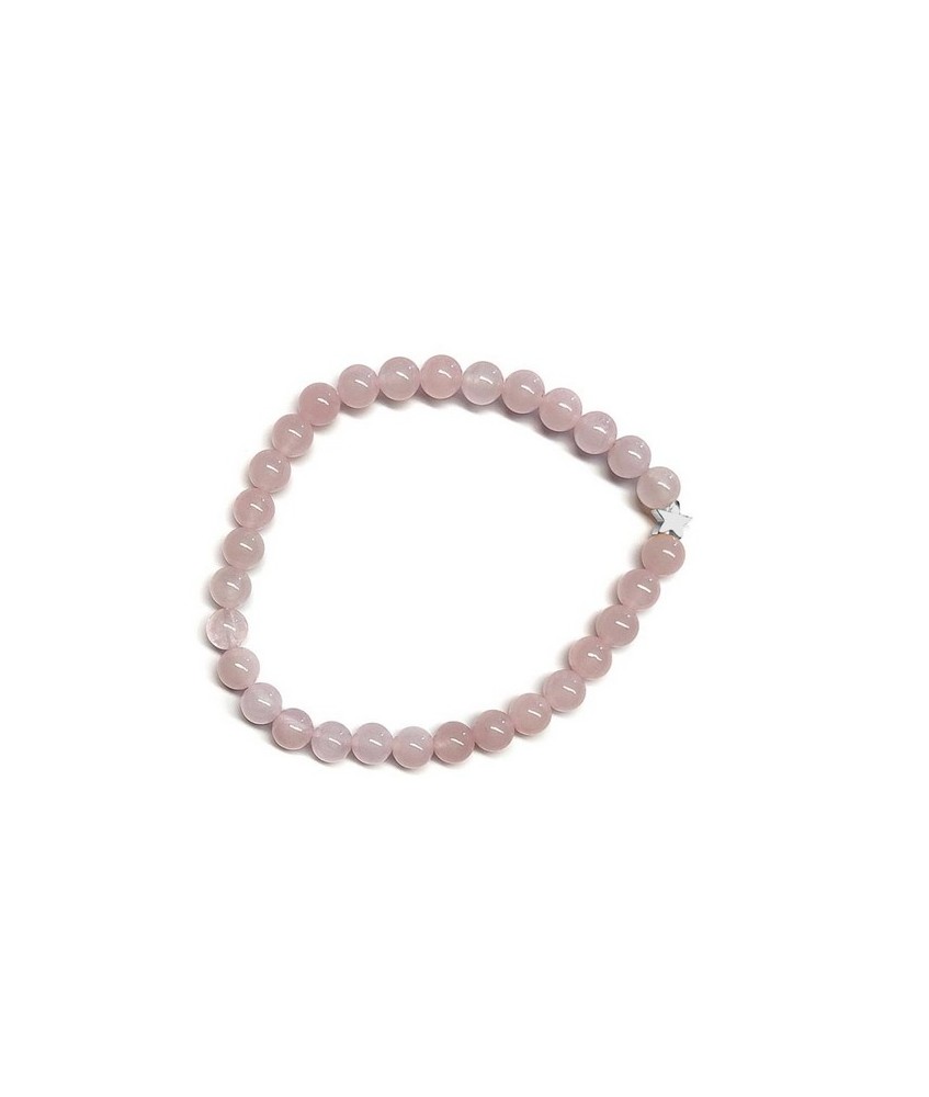Pulsera de Cuarzo Rosa (bolas de 6mm) con símbolo de estrella plateada.

En goma elástica.

Tarjeta exclusiva en 3 idiomas.
