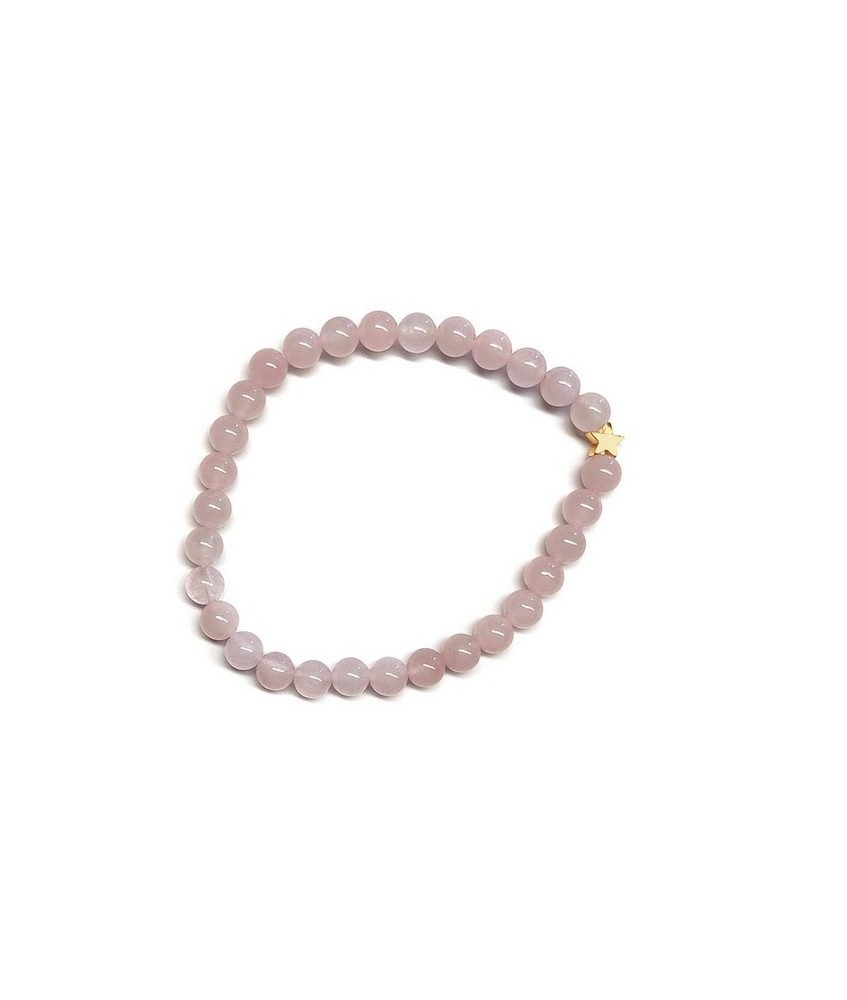 Pulsera de Cuarzo Rosa (bolas de 6mm) con símbolo de estrella dorada.

En goma elástica.

Tarjeta exclusiva en 3 idiomas.