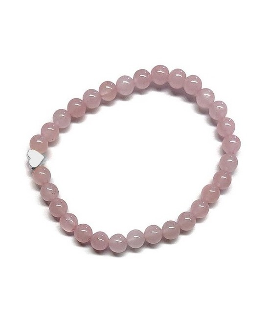 Pulsera de Cuarzo Rosa (bolas de 6mm) con símbolo de corazón plateado.

En goma elástica.

Tarjeta exclusiva en 3 idiomas.