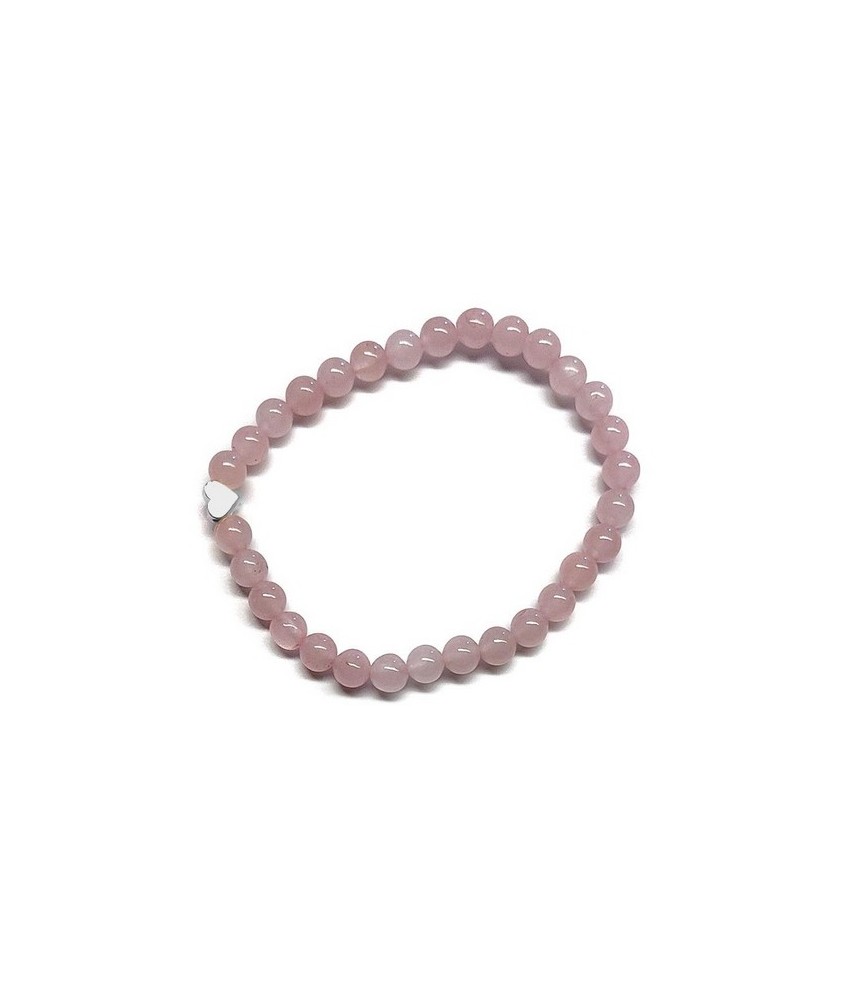 Pulsera de Cuarzo Rosa (bolas de 6mm) con símbolo de corazón plateado.

En goma elástica.

Tarjeta exclusiva en 3 idiomas.