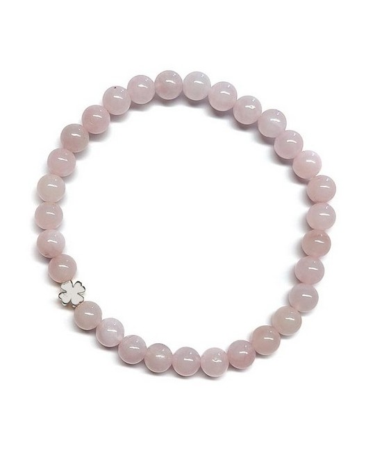 Pulsera de Cuarzo Rosa (bolas de 6mm) con símbolo de trébol plateado.

En goma elástica.

Tarjeta exclusiva en 3 idiomas