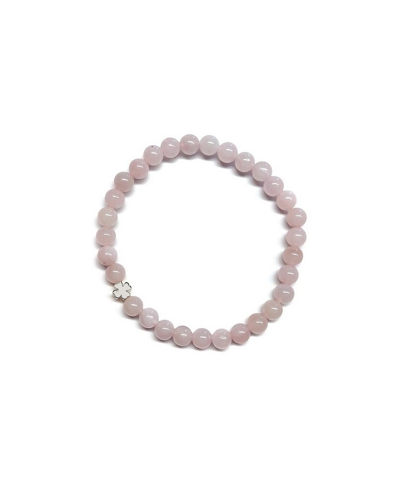 Pulsera de Cuarzo Rosa (bolas de 6mm) con símbolo de trébol plateado.

En goma elástica.

Tarjeta exclusiva en 3 idiomas