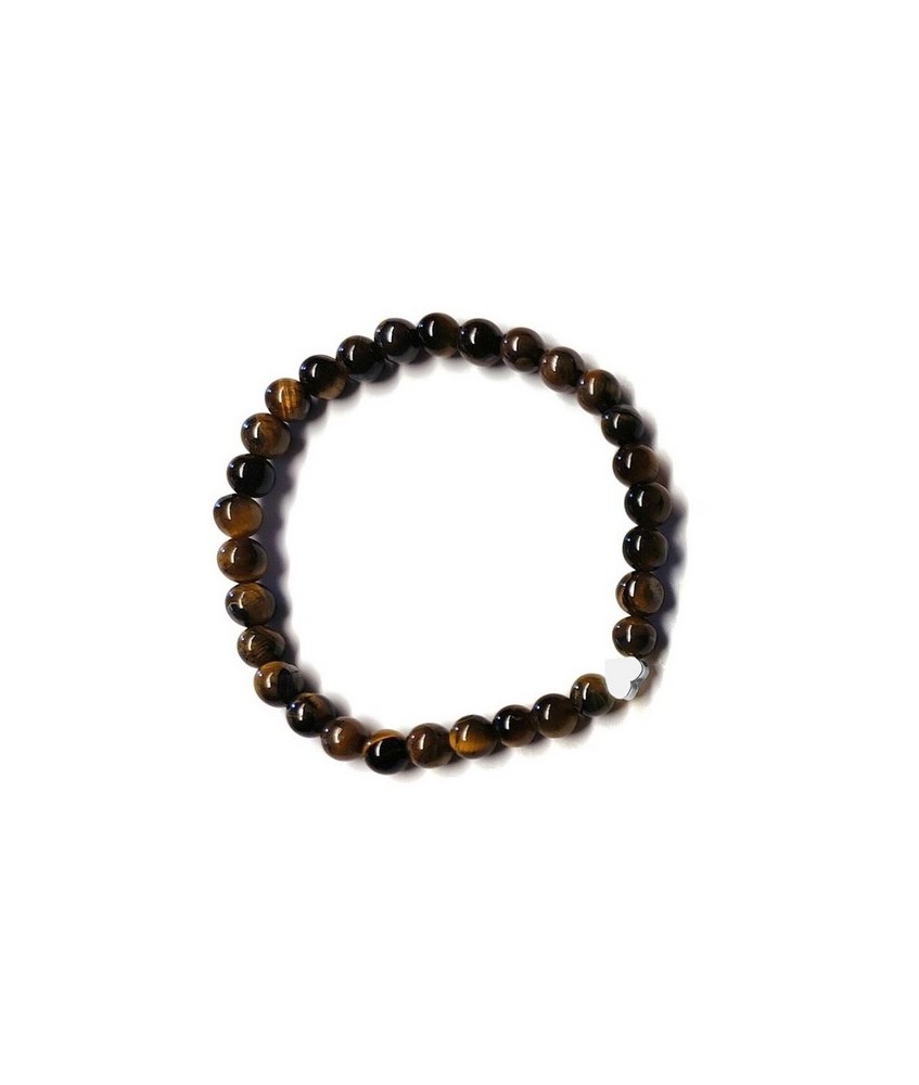 Pulsera de Ojo de Tigre (bolas de 6mm) con símbolo de corazón plateado.

En goma elástica.

Tarjeta exclusiva en 3 idiomas.